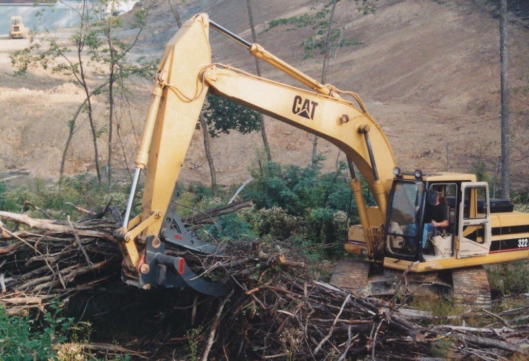 Excavator brush rake