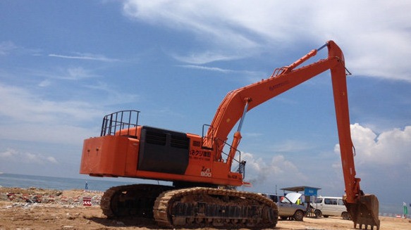 What role does the excavator long reach stick play in environmental protection
